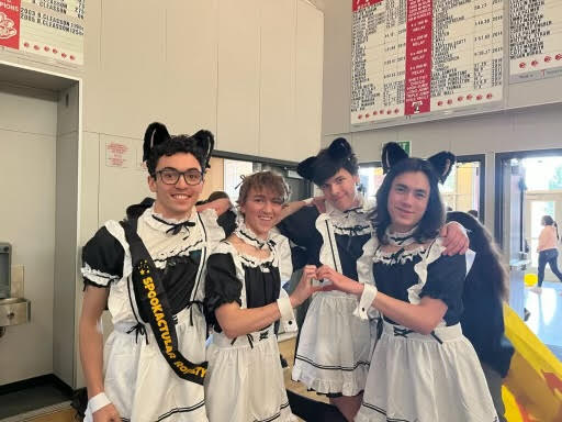 Asher Kates, Sean Meyers, Blake Starstev, Blake Jacobson pose in their Halloween costumes.